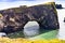 Dyrholaey Arch with Hole Reynisfjara Black Sand Beach Iceland