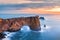 Dyrholaey rock formation at sunset