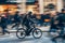 E-Bike Commuter in Motion, Urban Eco-Transport Amidst City Hustle