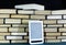 E-book on background of Big pile of books on dark background close up