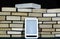 E-book on background of Big pile of books on dark background close up