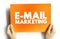 E-mail Marketing - act of sending a commercial message to a group of people, using email, text concept background