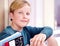 Eager young learner. Closeup portrait of a young boy sitting in a school hallway.