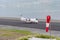 Eagle air Dornier 328 turboprop airplane on the runway of Isafjordur airport