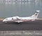 Eagle air Dornier 328 turboprop airplane on the runway of Isafjordur airport