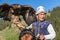 Eagle Hunter holds his eagles on horseback, ready to take flight