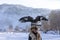 Eagle hunters are individuals who train and hunt with golden eagles in Mongolia.