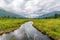 The Eagle River Flows into the Distance Between the Chugach Mountains