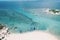 Eagle view of a beautiful white sand beach and blue sea