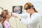 Ear, nose, throat examining. ENT doctor with a child patient and endoscope