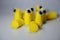 Ear plugs against hearing damage. Yellow plastic puffs in the ear that reduce noise and a quiet night\\\'s sleep.