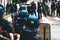 Ear view of police officers looking at journalists yellow vests protest