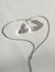Earbud pair headphone heart with shadow