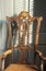 Early American hand carved chair with sun design