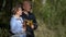 Early autumn day, aged man with his wife are admiring nature, portrait shot of loving pair