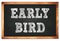 EARLY BIRD words on black wooden frame school blackboard