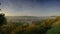 Early morning autumnal mist over East Meon village with Butser Hill and the South Downs in the background, South Downs National