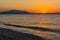 Early morning , dramatic sunrise over sea and mountain. Photographed in Asprovalta, Greece.