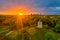 Early in the morning, the Monopteros temple in the English Garden in Munich, Germany with sun rays