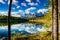 Early morning reflections in the crystal clear waters of Herbert Lake. Banff National Park Alberta Canada