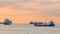 Early morning scene of cargo ships and tankers anchored off of Singapore`s coast timelapse