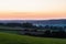 early morning with a sky full of beautiful colors during sunrise in the rolling hills landscape of Limburg