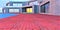 Early morning. Stylish red brick tile in front of the entrance to the country concrete house. Rising sun reflected in the glass