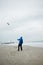 Early morning surfing training with a parachute near the sea