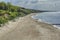 Early morning view from above on a wide empty Baltic beach