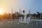 An early morning view of the Blue Mosque with its towering minarets, across the cascading fountains