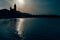 Early morning view of the coast in Sitges town near Barcelona in Catalonia,Spain with Parroquia de Sant Bartomeu i Santa Tecla chu