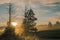 Early morning view of hills and forests in romantic mist and haze on warm summer morning on Strmca, slovenia. Sun peeking through