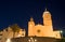 Early morning view at illuminated Parroquia de Sant Bartomeu i Santa Tecla church in Sitges town near Barcelona in Catalonia,