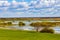 Early spring panoramic view of Biebrza river valley wetlands and nature reserve landscape in Burzyn village in Poland