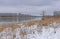 Early Spring Snow on the Prairie Grasses