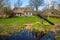 Early spring view on Giethoorn, Netherlands, a traditional Dutch village with canals and rustic thatched roof farm houses