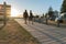 Early start to day walkers out on Mount boardwalk cast long shadows as sun rises