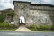 In early summer sunshine the picturesque entrance gate of travel destination Penne d`Agenais waits for visitors