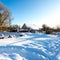 Early winter morning. Traditional Russian village in snowy frost winter