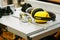 Earmuffs and Safety glasses on Electric saw table in workshop .Work safety concept . selective focus