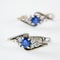 Earring and ring set with big blue sapphire and white diamonds around, jewerly shop, pawnshop concept