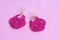 Earrings from beads handmade. Pink colour. Needlework at home. Bead jewelery.