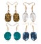 Earrings made of plastic and glass on a white background. Four p