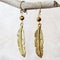 earrings on neutral background