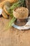 Ears of barley flour, bread on a wooden background