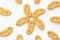 Ears cookies on white background,  sweet pretzels, sprinkled with sugar, top view, isolated
