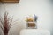 Ears of wheat in a textured wooden box in the kitchen in a rustic style. Old retro fridge. Interior details of light Scandinavian