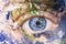 Earth awakening concept, save the planet. Close up image of woman face with earth painted. Creative composite of macro