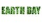 Earth Day celebration card with inscription on green grass.