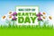 Earth Day poster with green grass and flowers